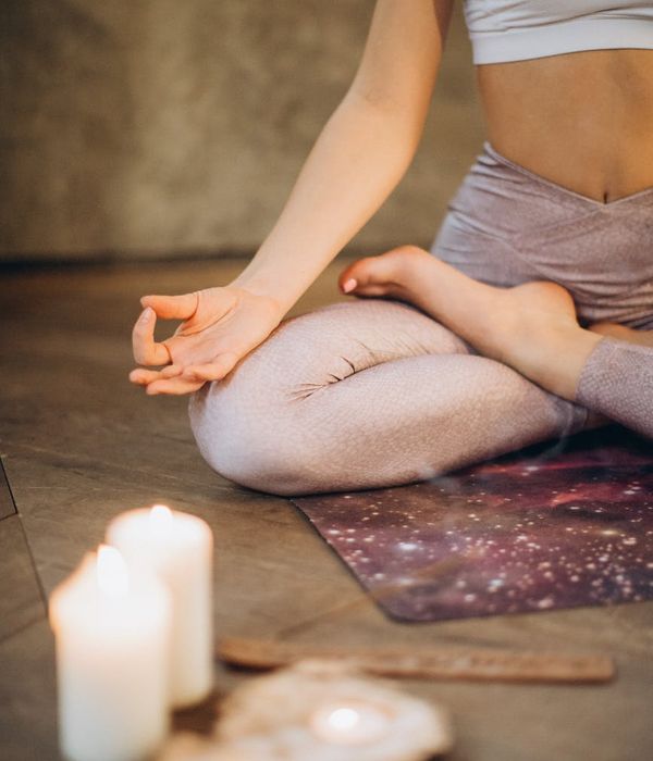 Woman in a calm yoga pose, embodying inner peace and balance.